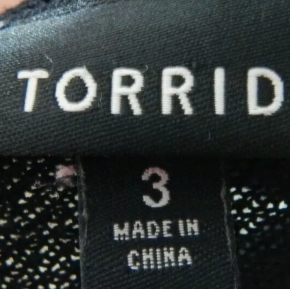 Torrid Black White Knit Panel Leopard Top - Picture 2 of 3